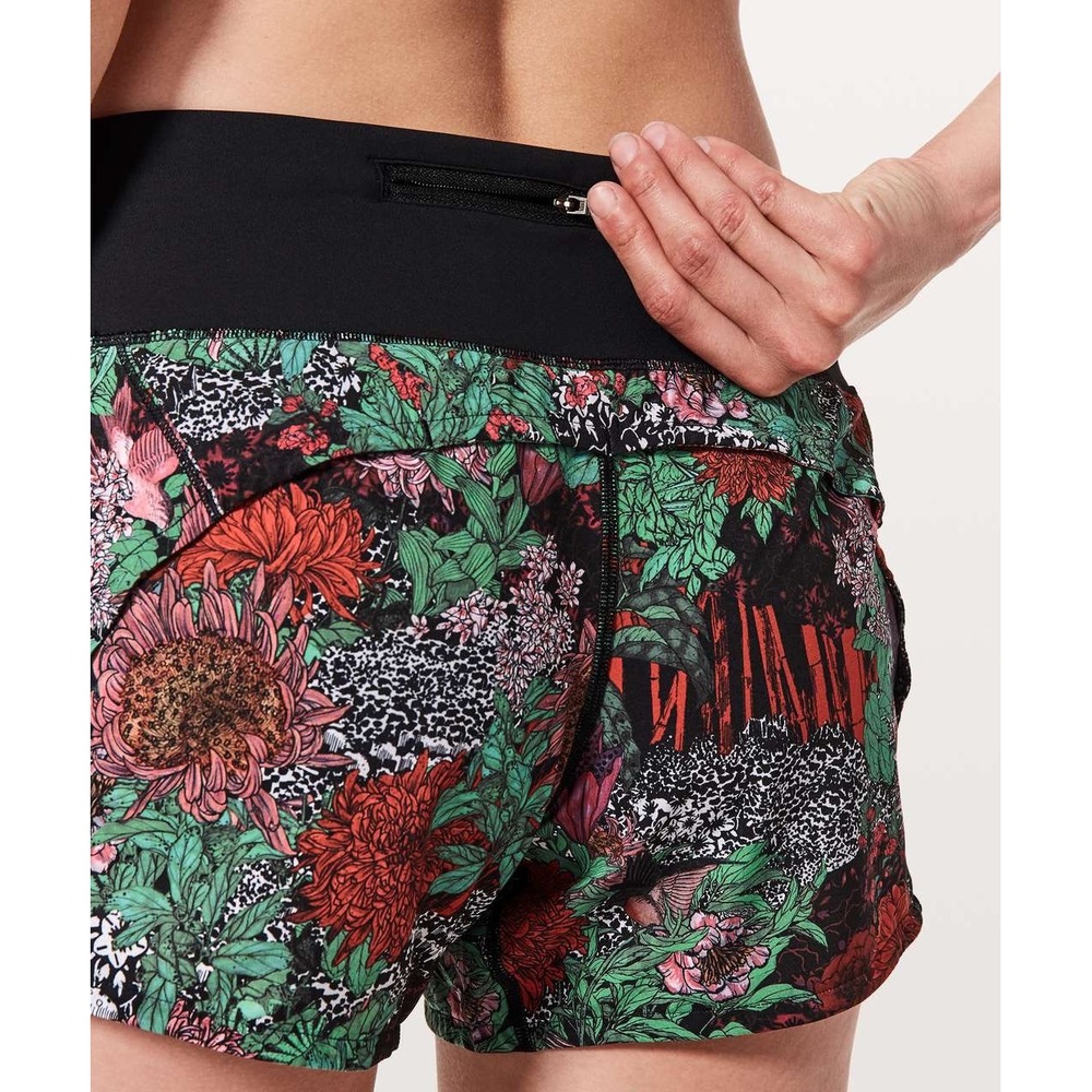 Lululemon Tracker reversible shorts size 4 Red Floral Leopard Print Athletic 4"